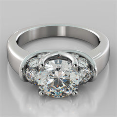 Silver ring with a central diamond and smaller diamonds on a gray background