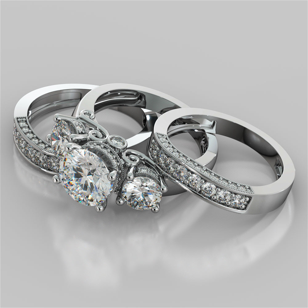 Round Cut Three Stone Filigree Engagement Ring with Crown Accents