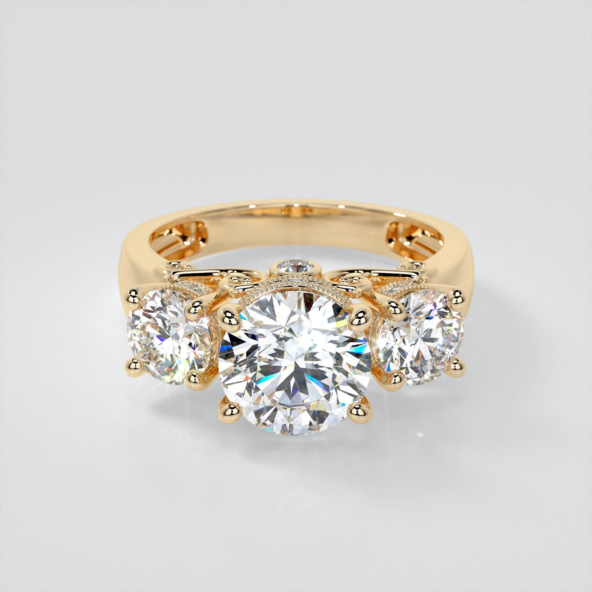 3.16 CTW Round Cut Three-Stone Filigree Engagement Ring set in 14K Yellow Gold