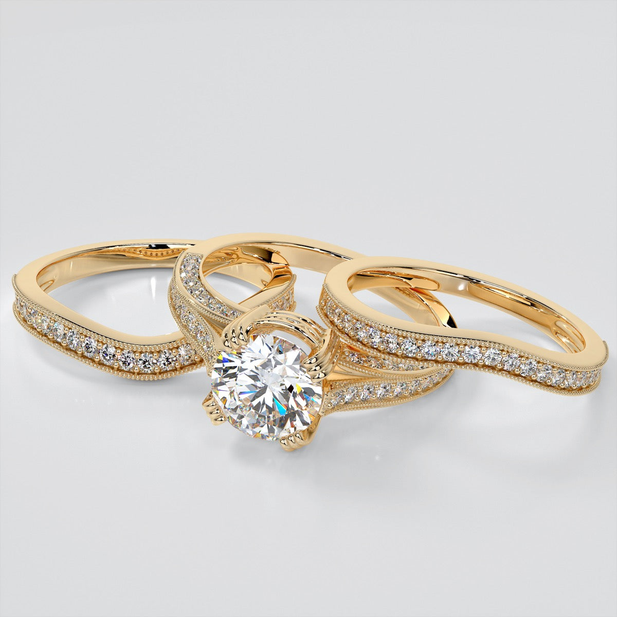 Accented Claw Round Cut Trio Wedding Set