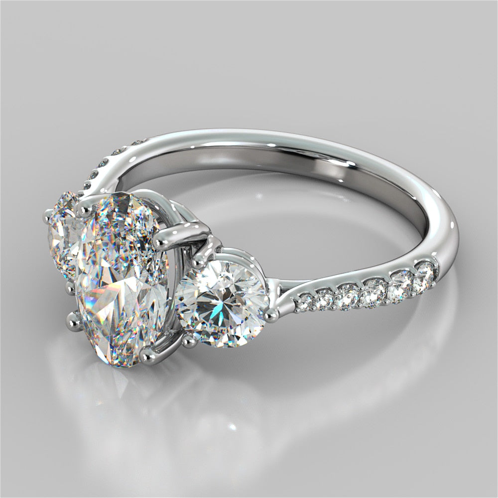 Oval Cut Accented Three-Stone Wedding Set With 2 Matching Bands