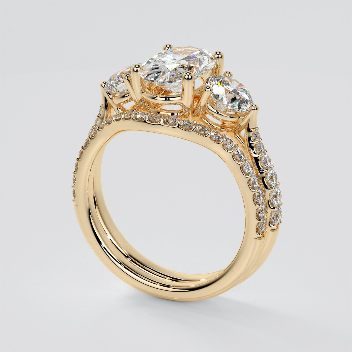 Oval Cut Accented Three-Stone Wedding Set With 2 Matching Bands