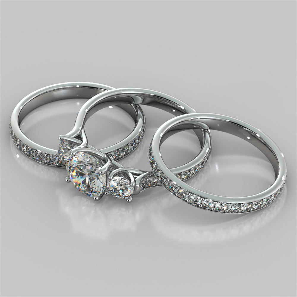 Round Cut Three Stone Trellis Wedding Set With 2 Matching Bands