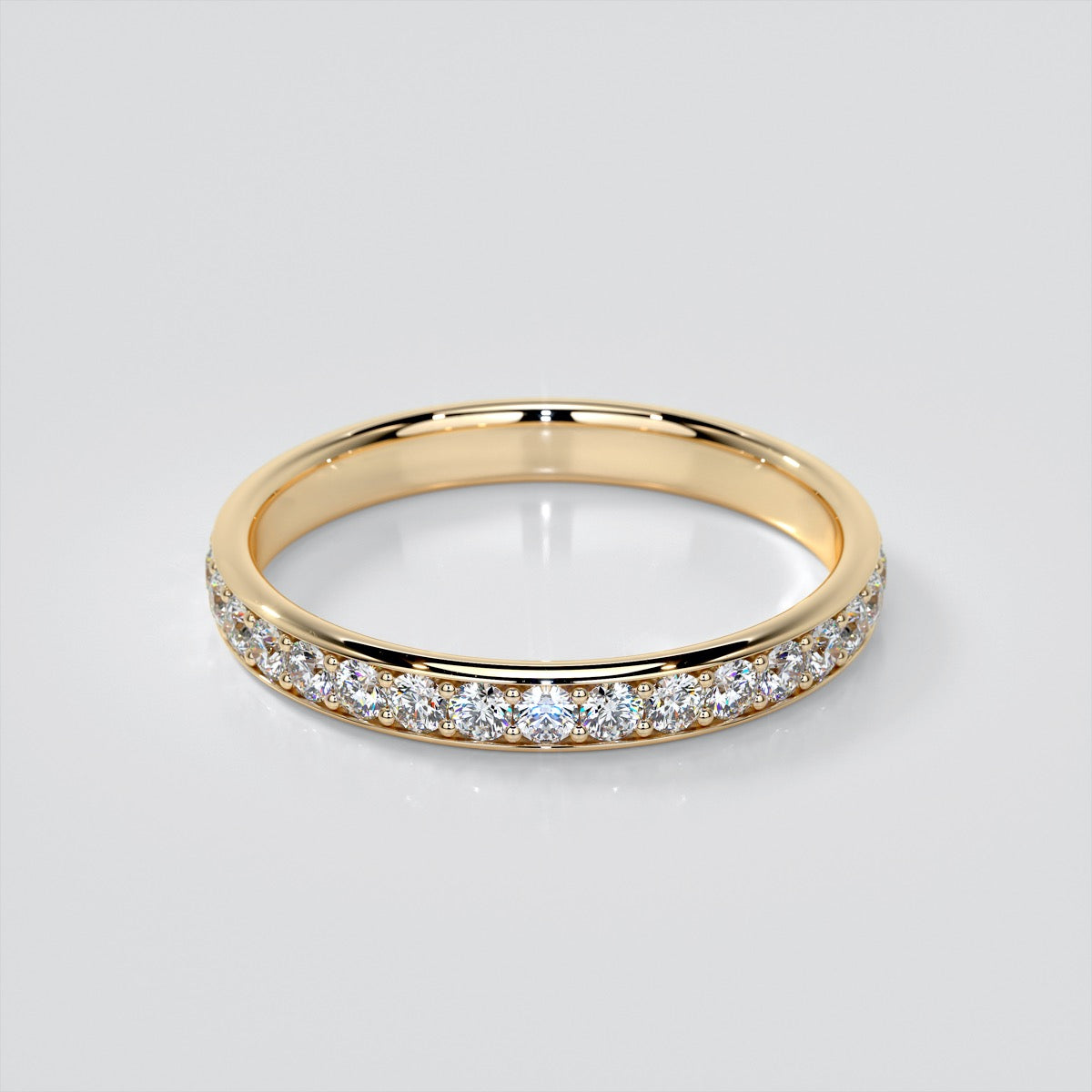Channel Set Wedding Band With Round Accents