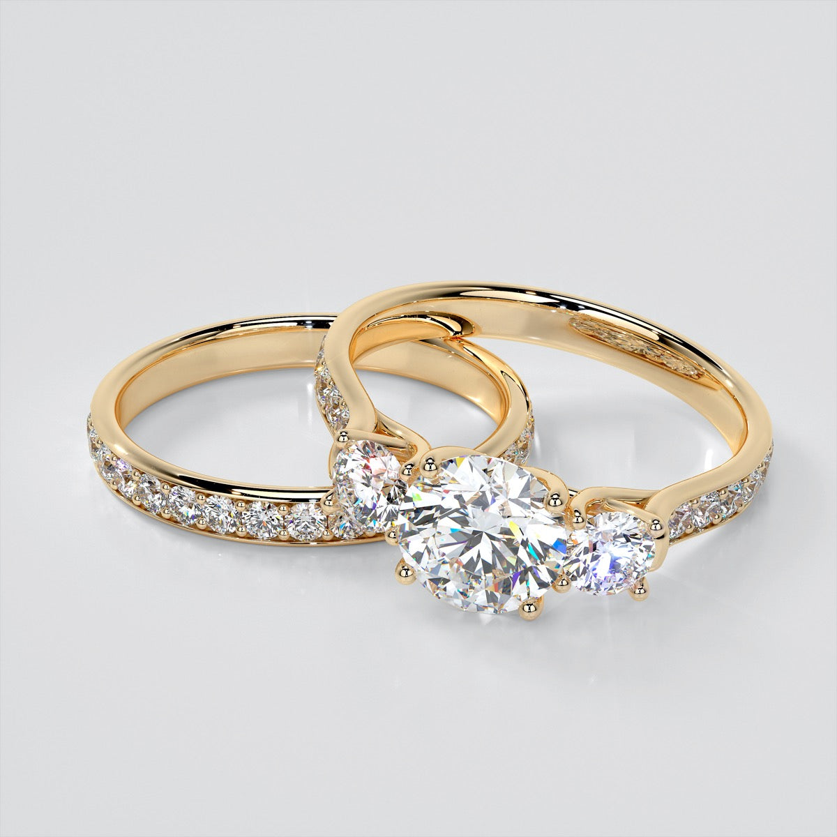 Round Cut Three Stone Trellis Wedding Set With 2 Matching Bands