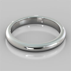 Silver ring on a reflective gray surface