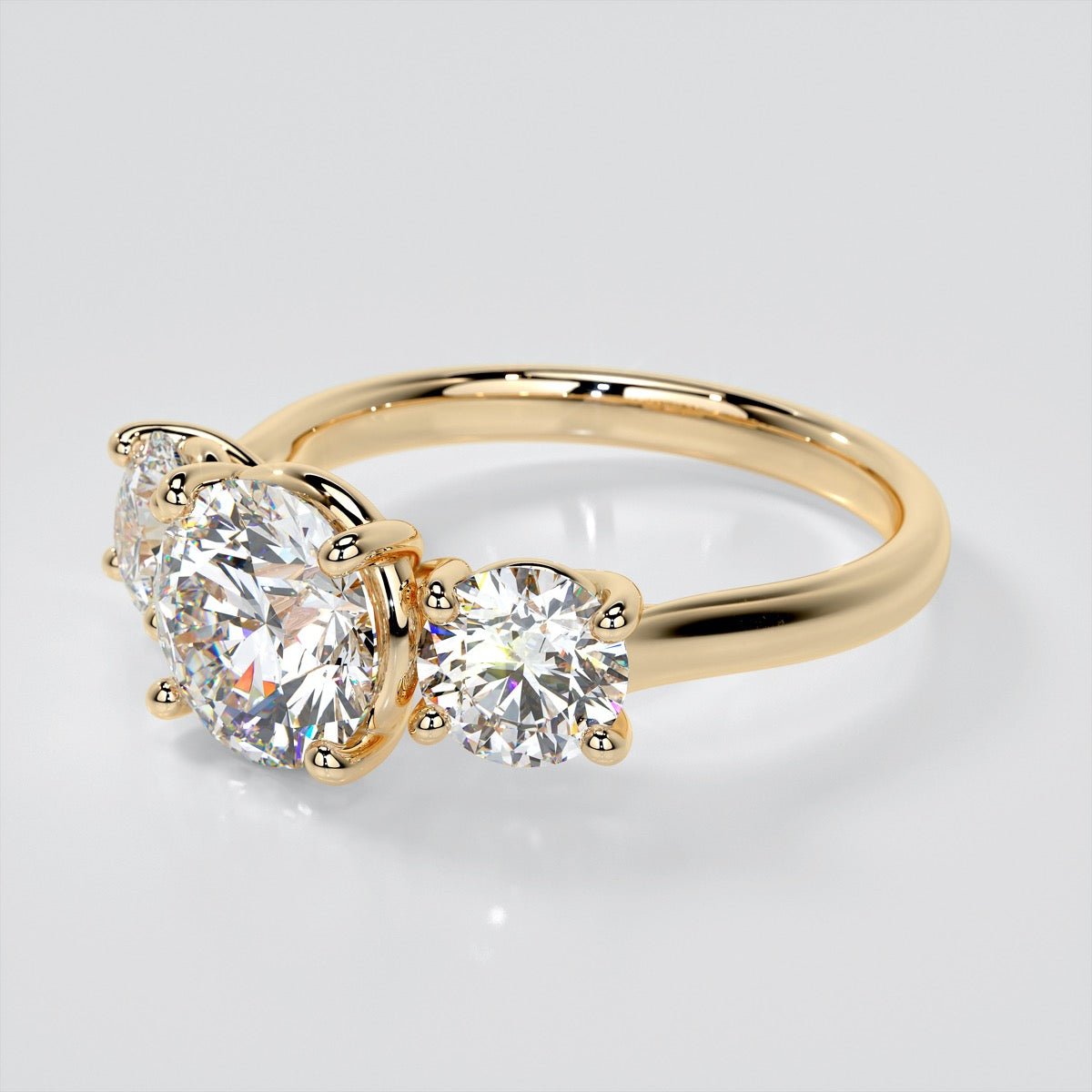 Round Cut Three-Stone Engagement Ring With Accents