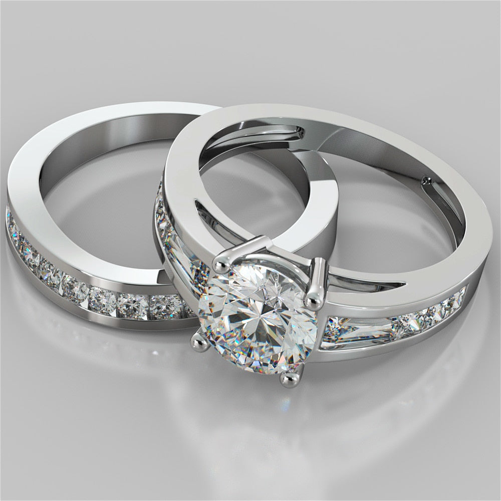 1.5CT Round Cut Lab Grown Diamond Cathedral Engagement Ring with Baguette Accents