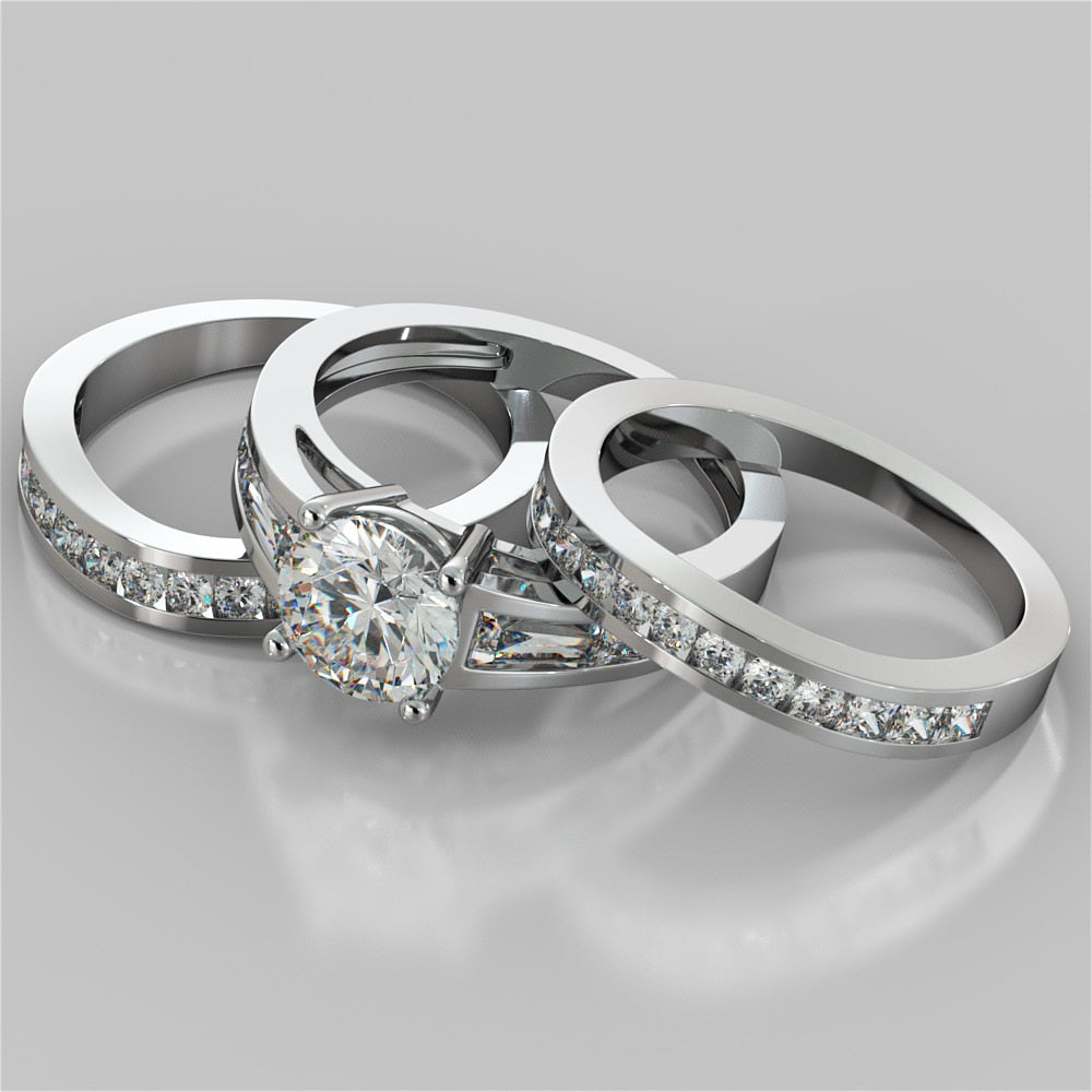 1.5CT Round Cut Lab Grown Diamond Cathedral Engagement Ring with Baguette Accents