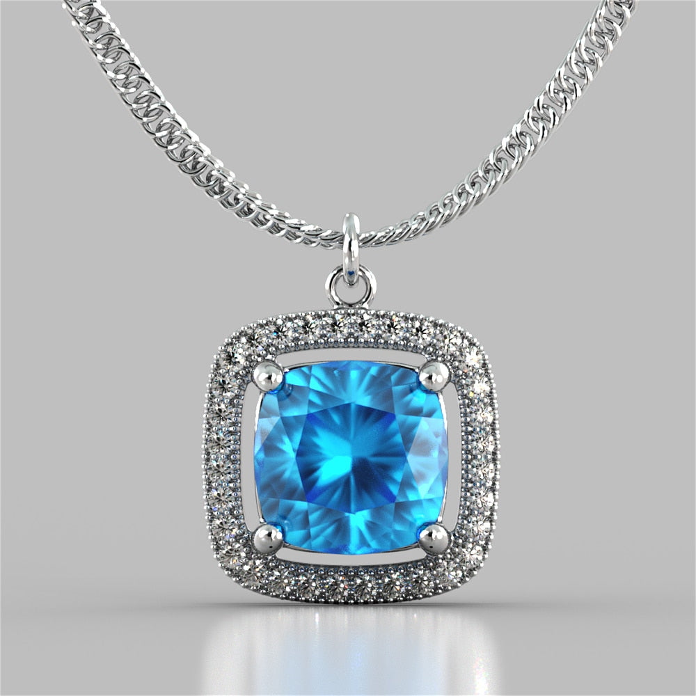 Cushion Style Halo Pendant with Round Cut Color Center Stone