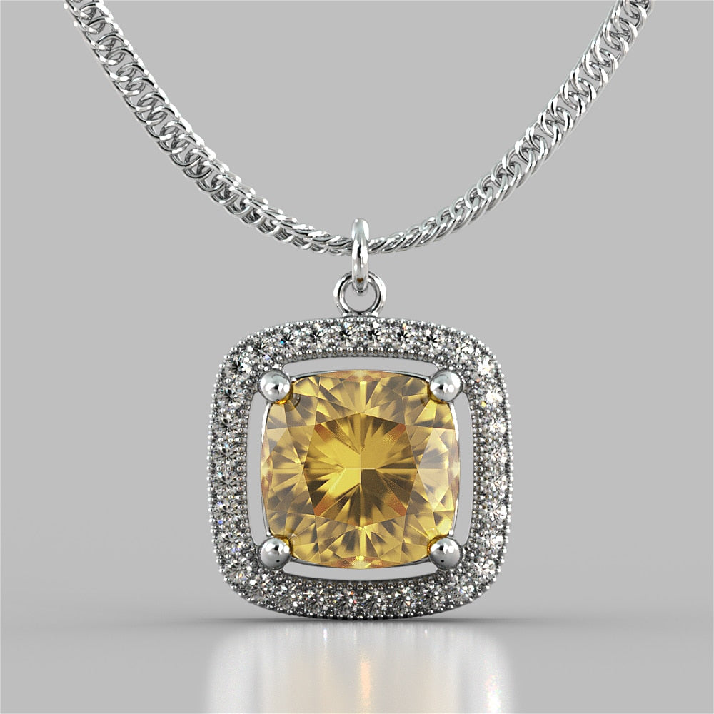 Cushion Style Halo Pendant with Round Cut Color Center Stone