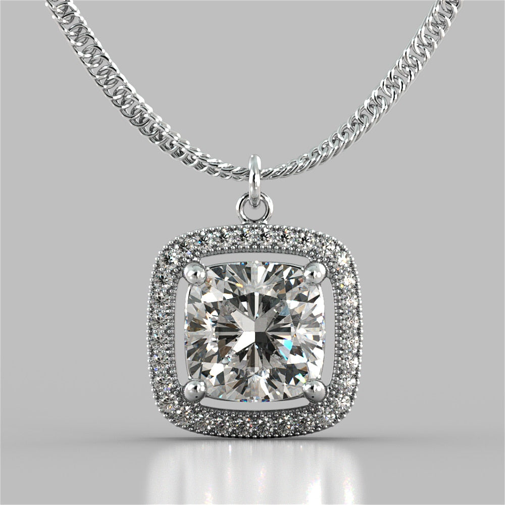 Cushion Style Halo Pendant with Round Cut Color Center Stone