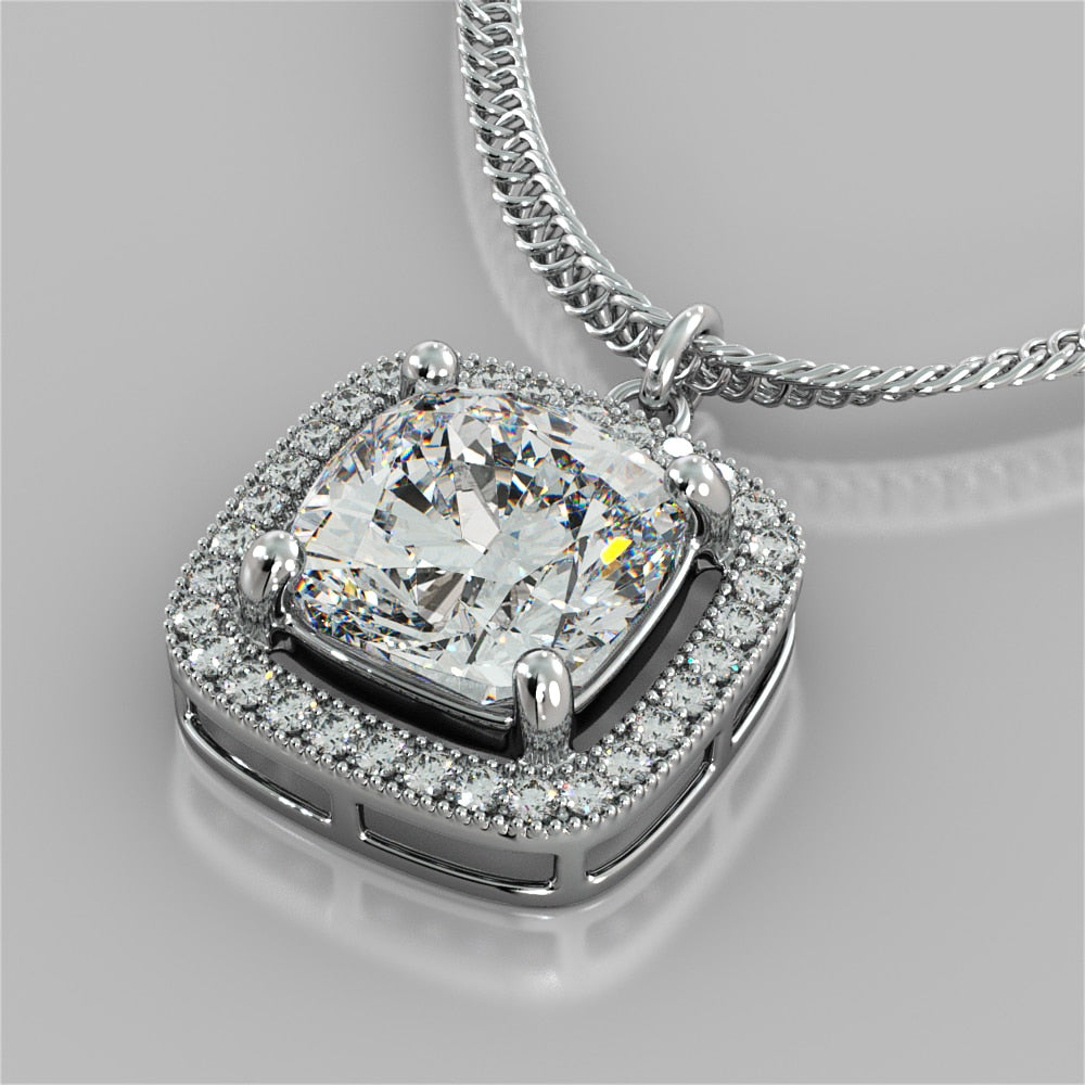 Cushion Style Halo Pendant with Round Cut Color Center Stone