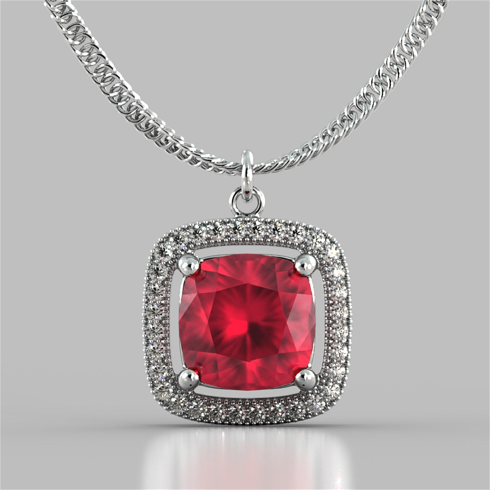 Cushion Style Halo Pendant with Round Cut Color Center Stone
