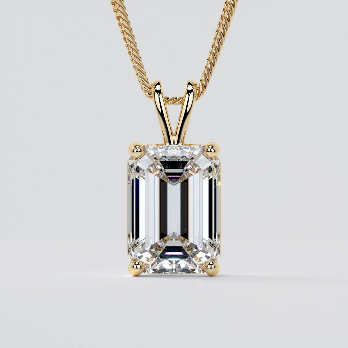 3.0CT Emerald Cut Solitaire Pendant set in 14K White Gold With Diamond Cut Cable Chain