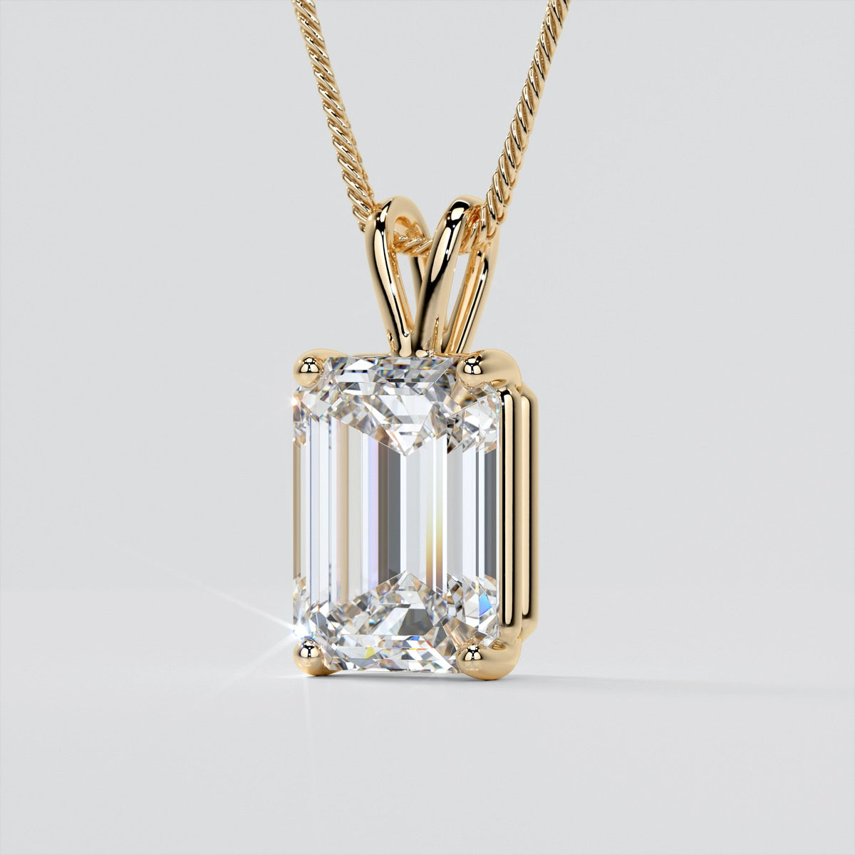 3.0CT Emerald Cut Solitaire Pendant set in 14K White Gold With Diamond Cut Cable Chain