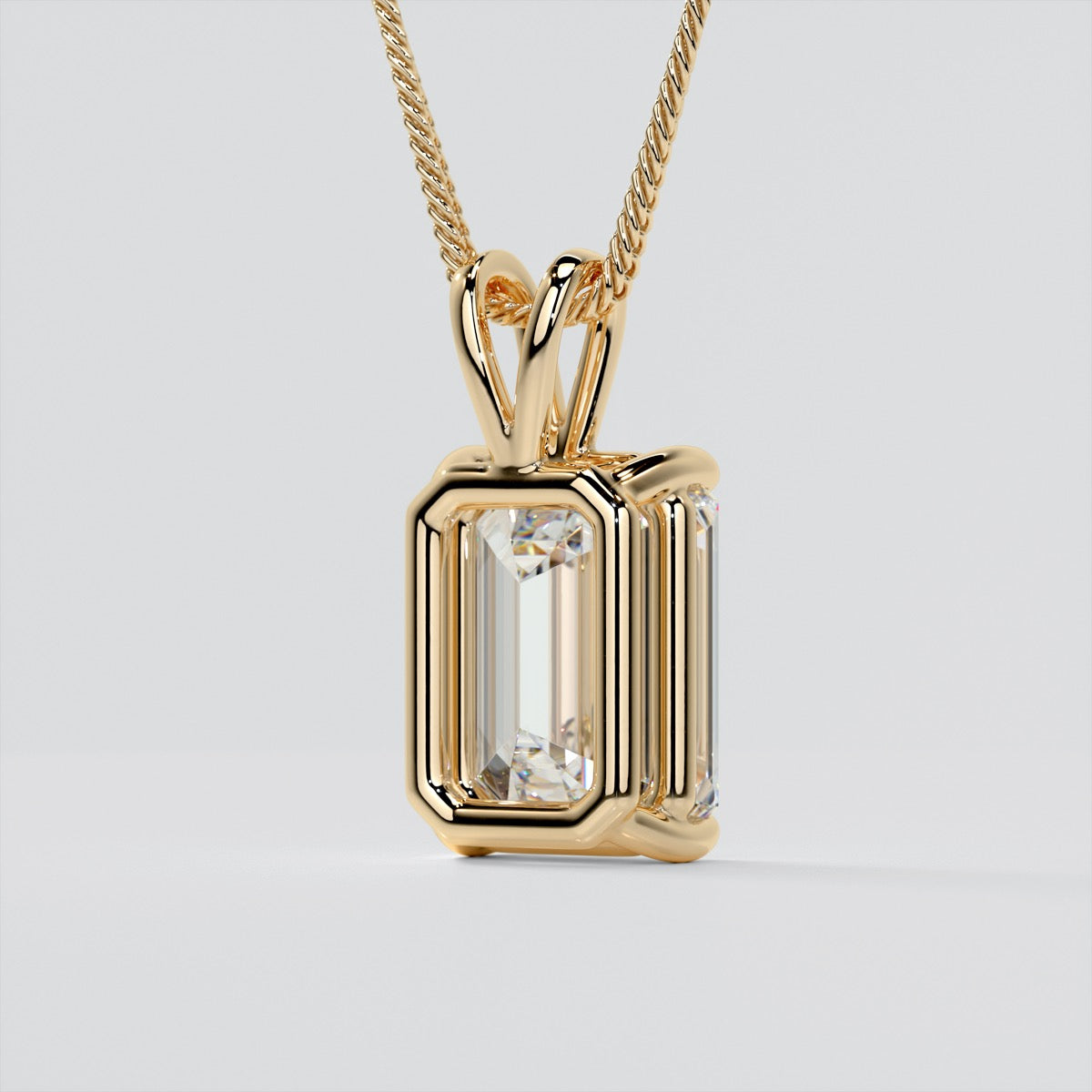 Emerald Cut Solitaire Pendant With Diamond Cut Cable Chain