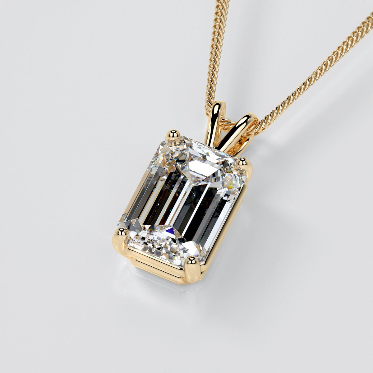 3.0CT Emerald Cut Solitaire Pendant set in 14K White Gold With Diamond Cut Cable Chain