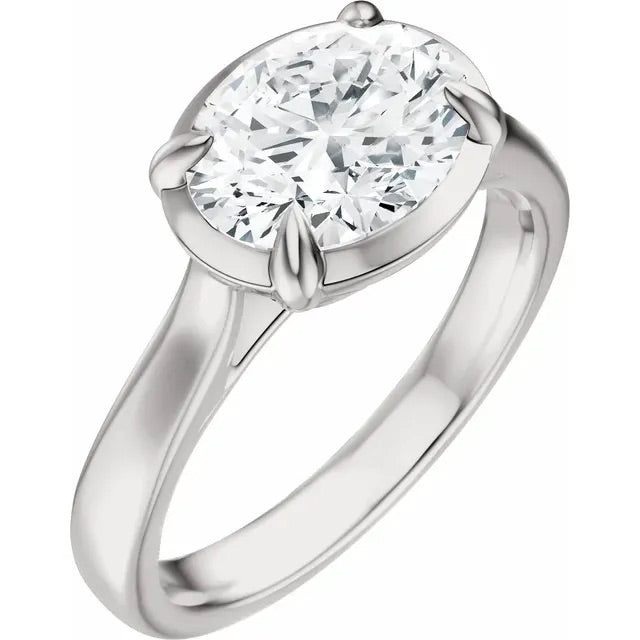 Oval Cut Lab Grown Diamond Bezel Set Engagement Ring with Claw Prongs