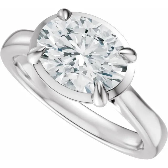 Oval Cut Lab Grown Diamond Bezel Set Engagement Ring with Claw Prongs