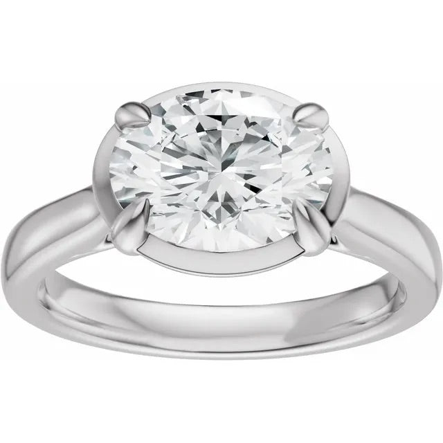 Oval Cut Lab Grown Diamond Bezel Set Engagement Ring with Claw Prongs