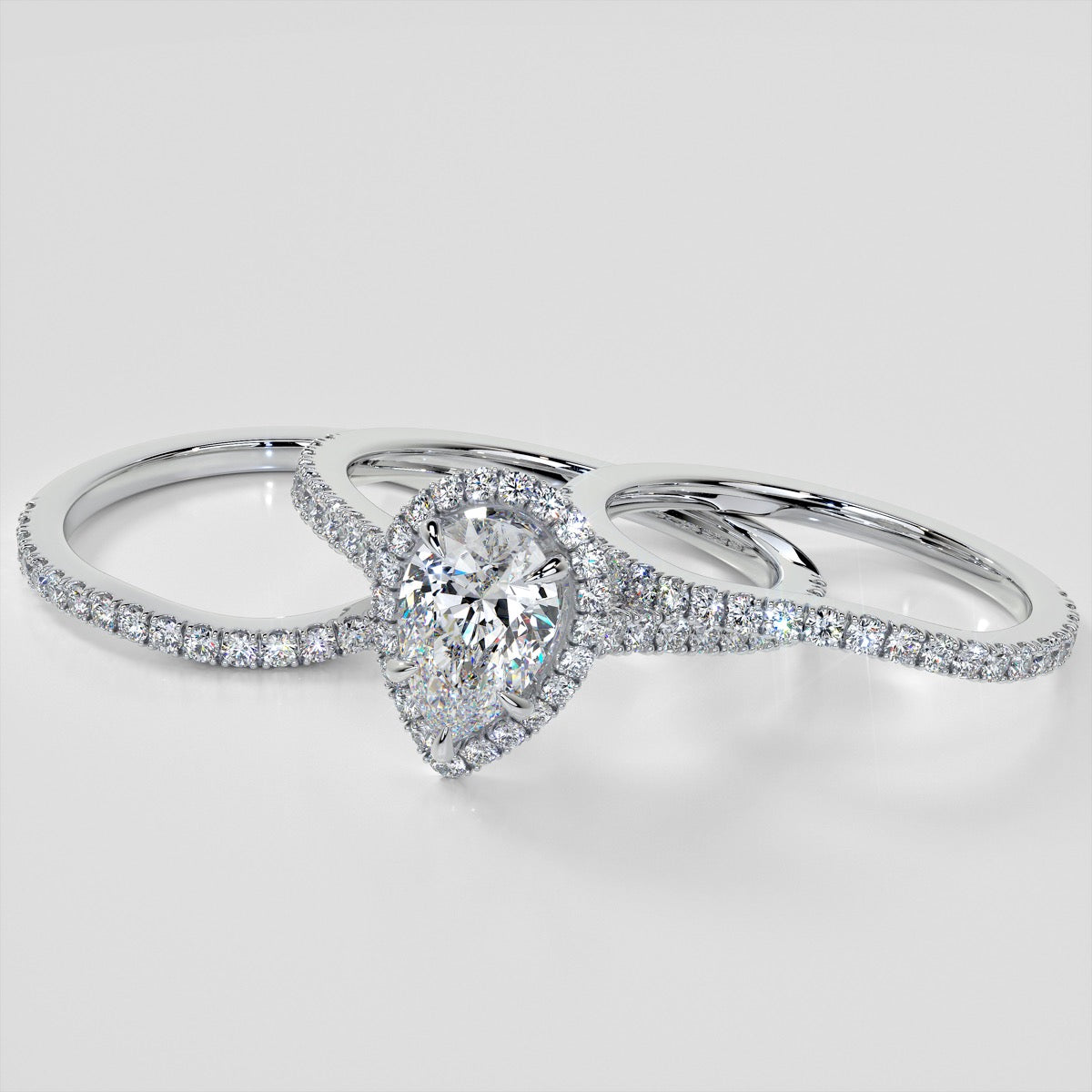 Pear Cut Halo Trio Wedding Set With Accents