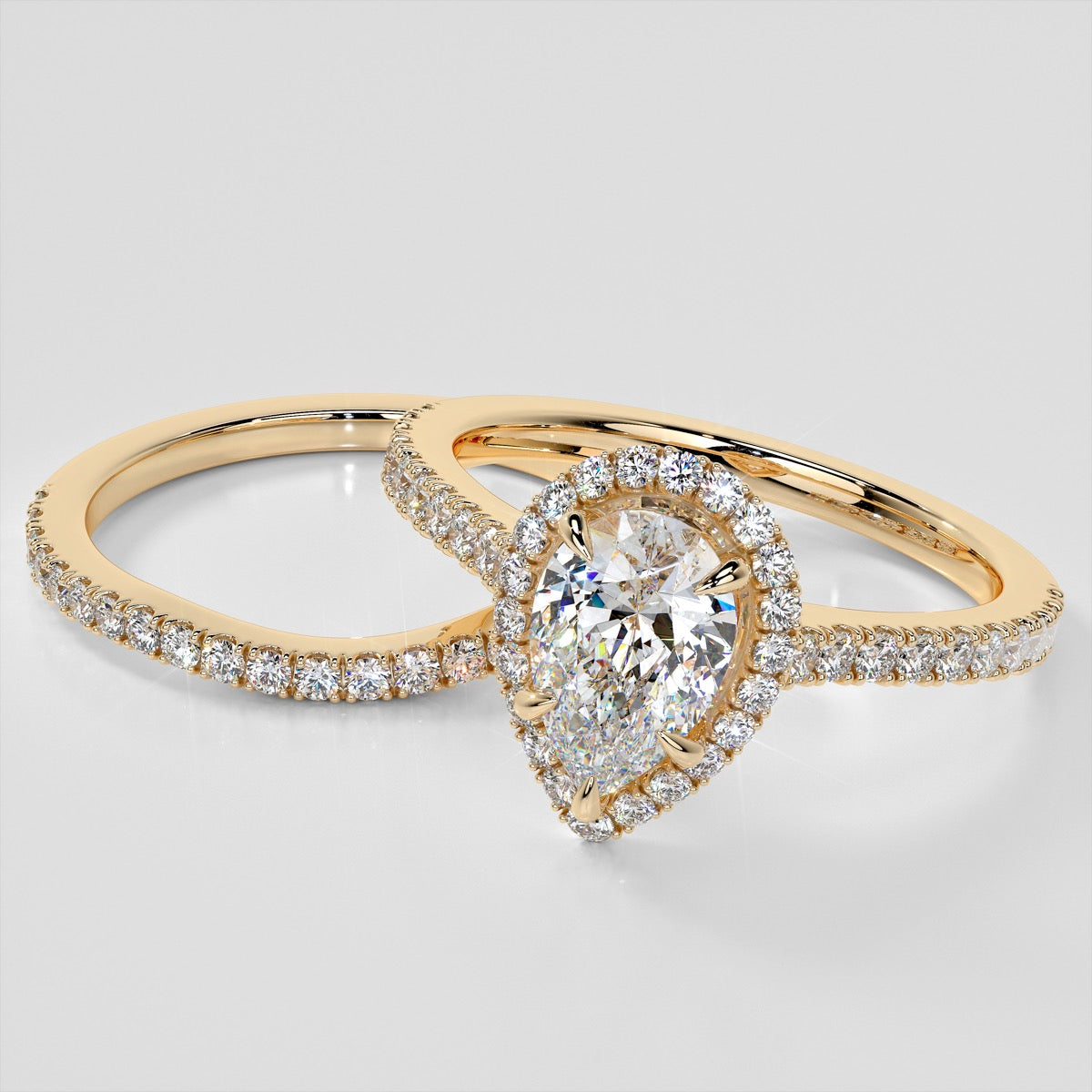 Lab Grown Diamond Pear Cut Halo Engagement Ring With Accents