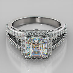 Silver ring with a large diamond and smaller diamonds on a gray background
