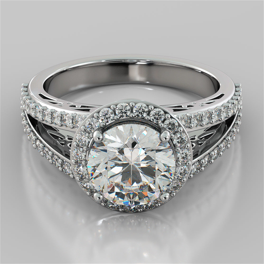 Silver ring with a large diamond and smaller diamonds on a gray background