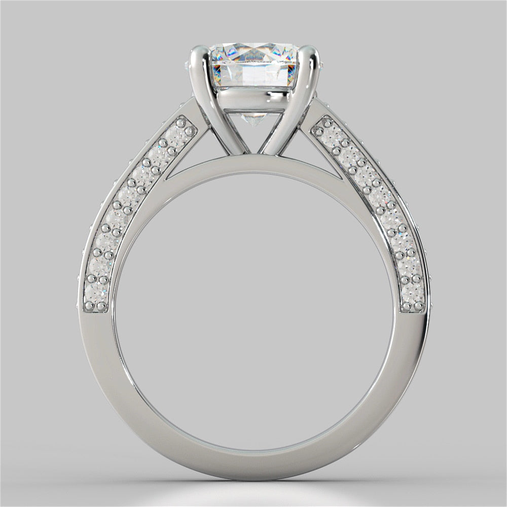 Round Cut Cathedral Engagement Ring with Channel Set Accents