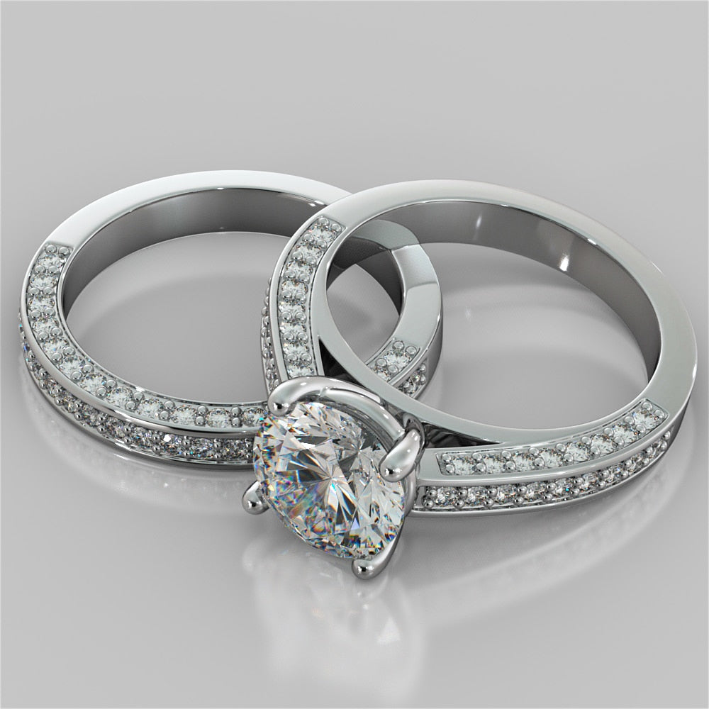 Round Cut Cathedral Engagement Ring with Channel Set Accents