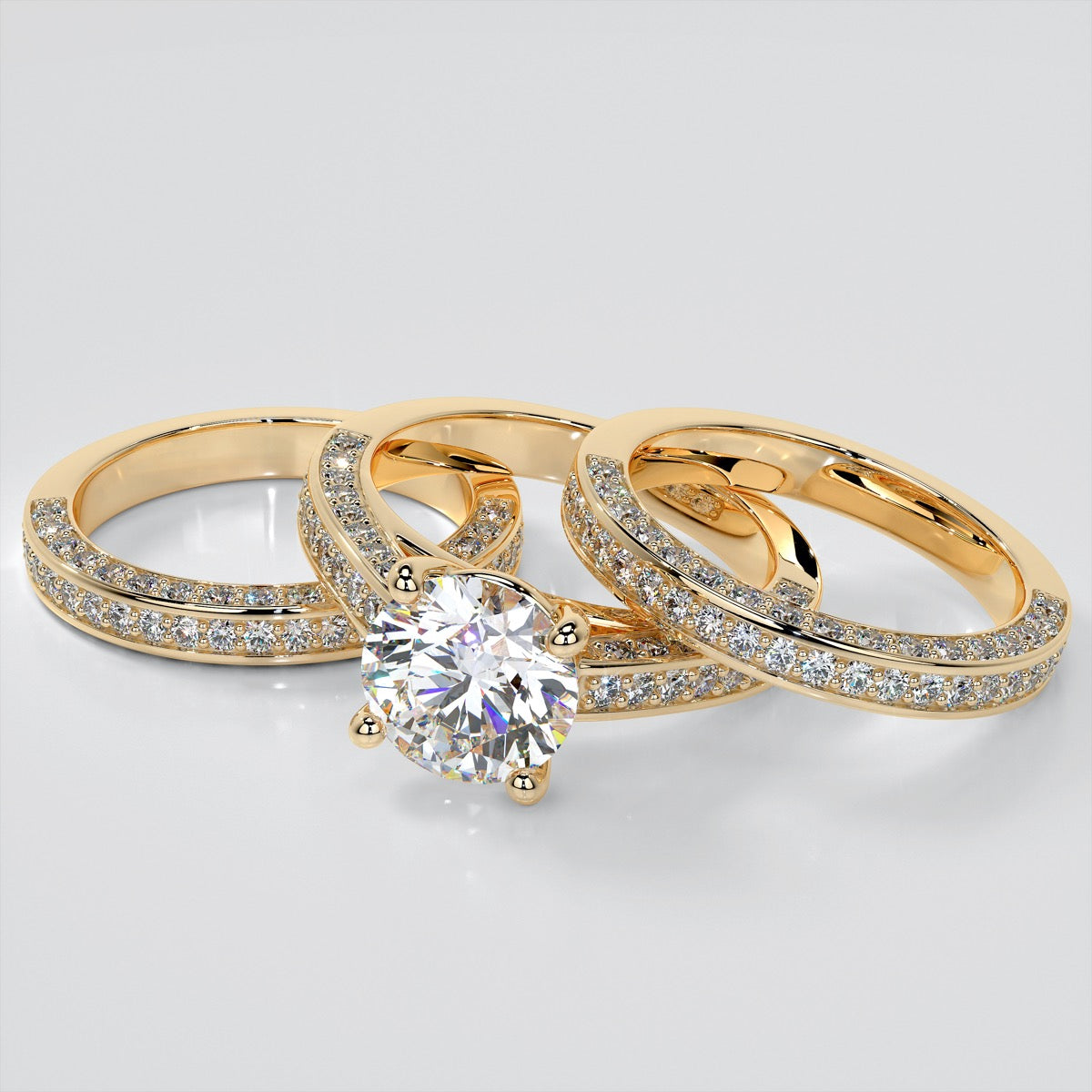 Round Cut Cathedral Style Trio-Wedding Set with Channel Set Accents