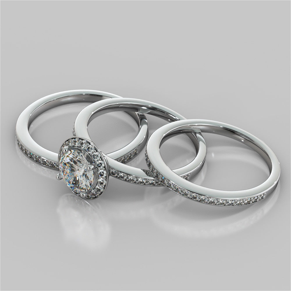 Round Cut Pavé Style Halo Wedding Set With 2 Matching Bands
