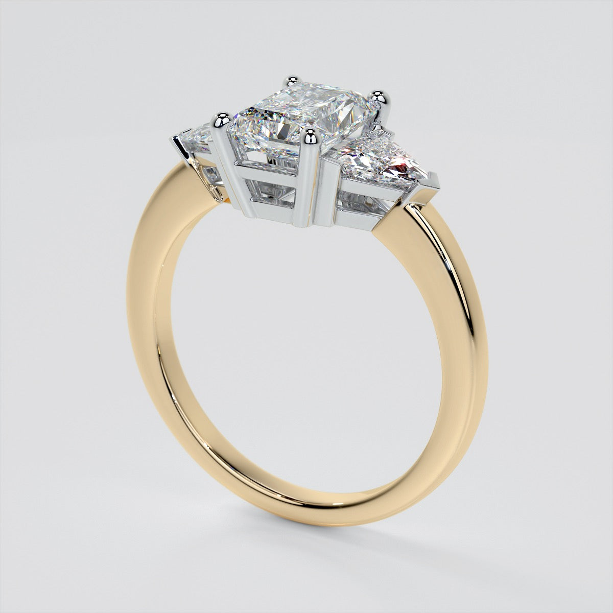 Radiant Cut Three-Stone Engagement Ring With Trillion Accents