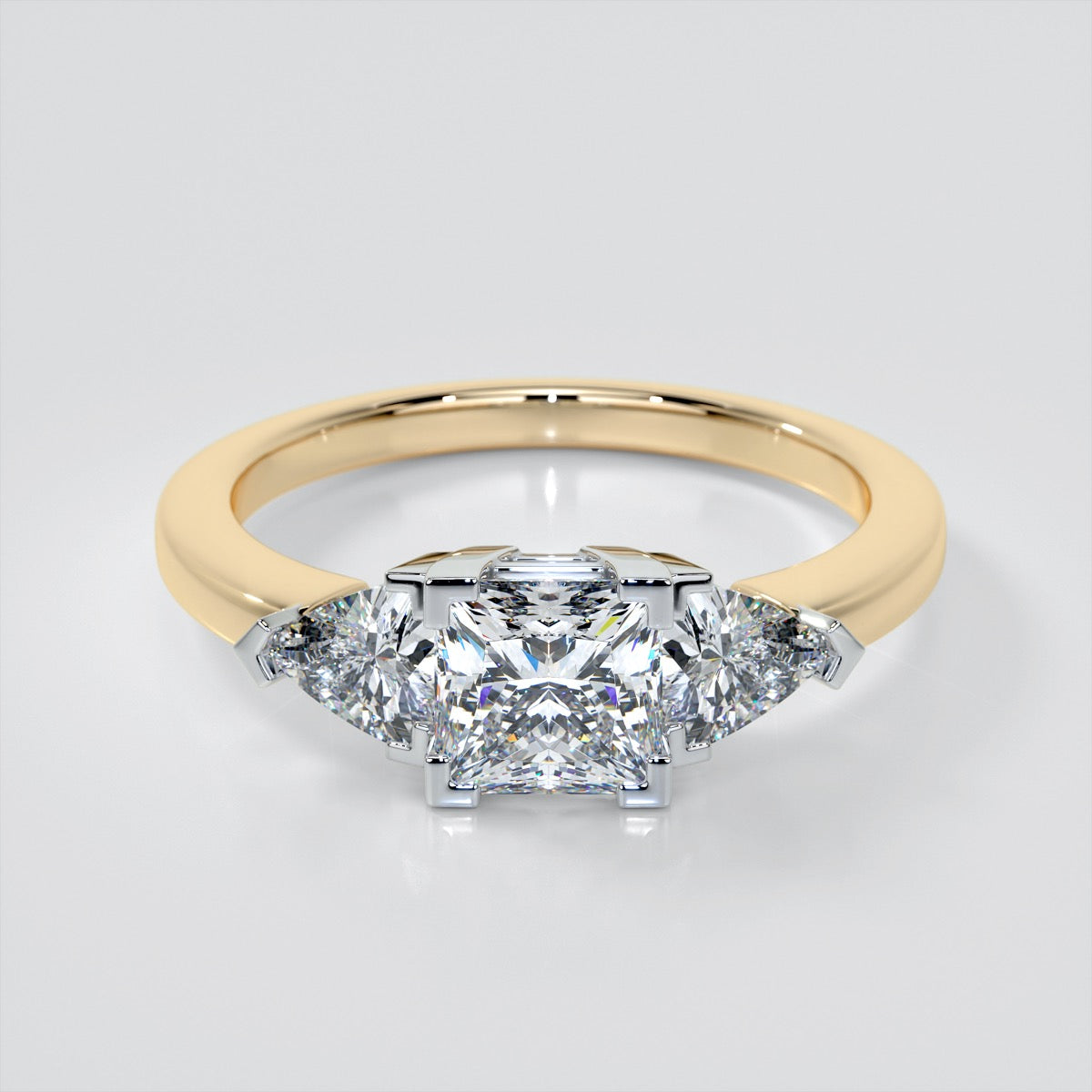 Princess Cut Three-Stone Engagement Ring With Trillion Accents