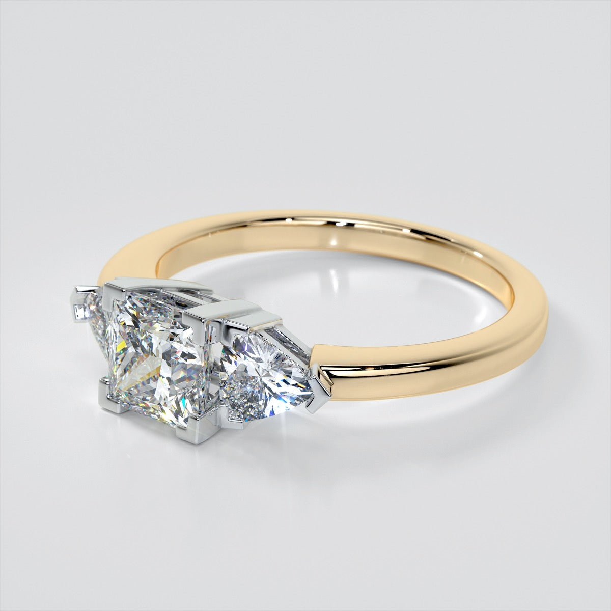 Princess Cut Three-Stone Engagement Ring With Trillion Accents