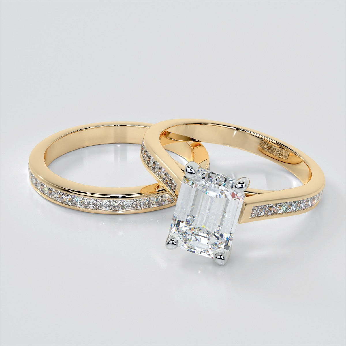 Lab Grown Diamond Emerald Cut Cathedral Style Engagement Ring With Princess Cut Accents