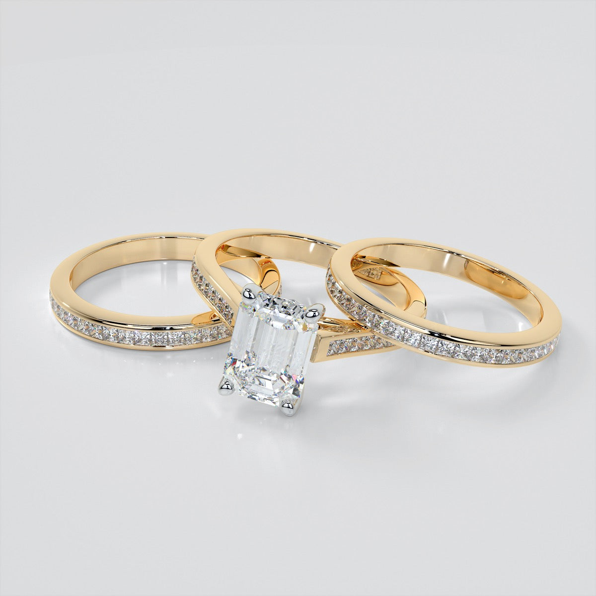 Emerald Cut Cathedral Style Engagement Ring With Princess Cut Accents