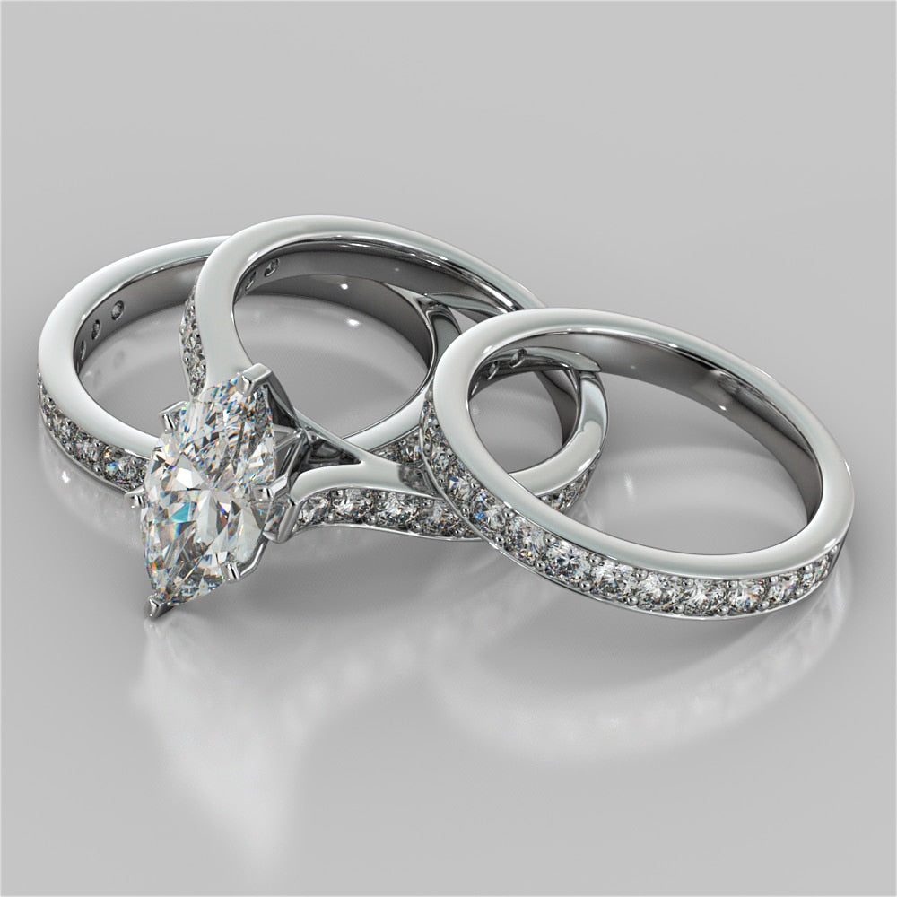 Marquise Cut Cathedral Style Channel Engagement Ring With Accents