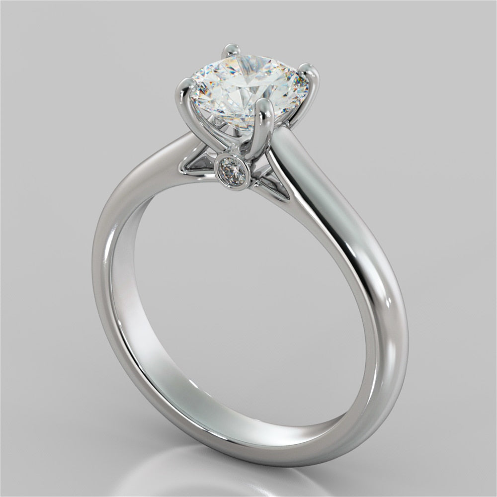 Round Cut Cathedral Engagement Ring With Accents