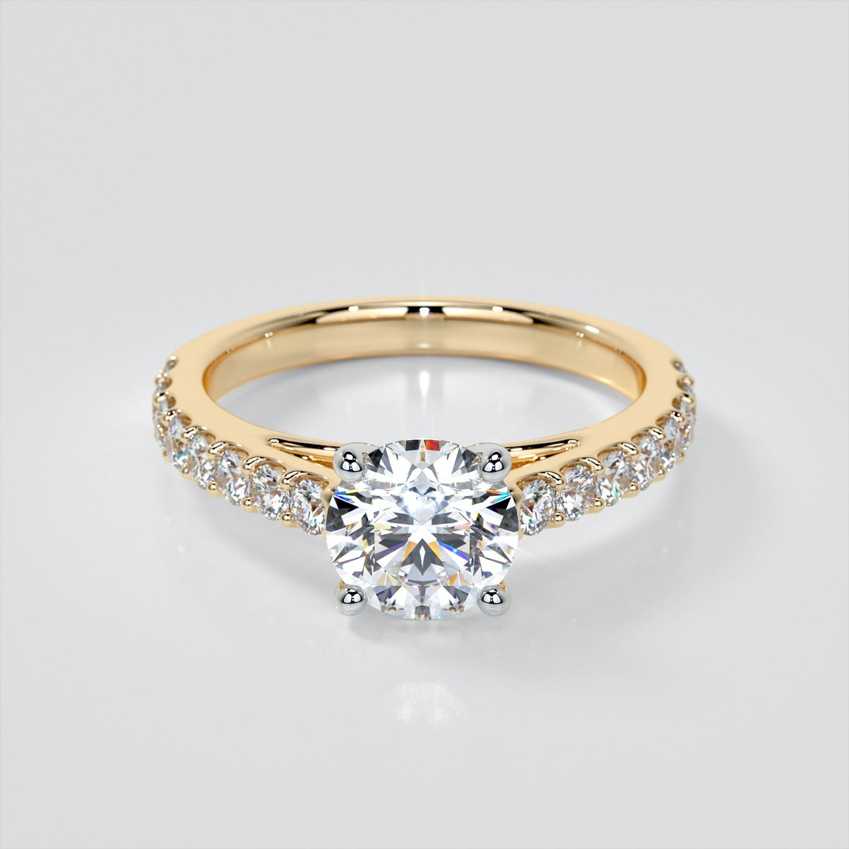 Round Cut Cathedral Style Engagement Ring With Side Accents