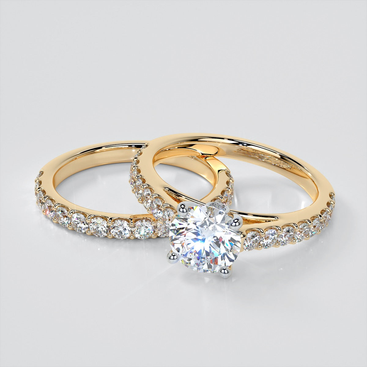 Round Cut Cathedral Style Engagement Ring With Side Accents