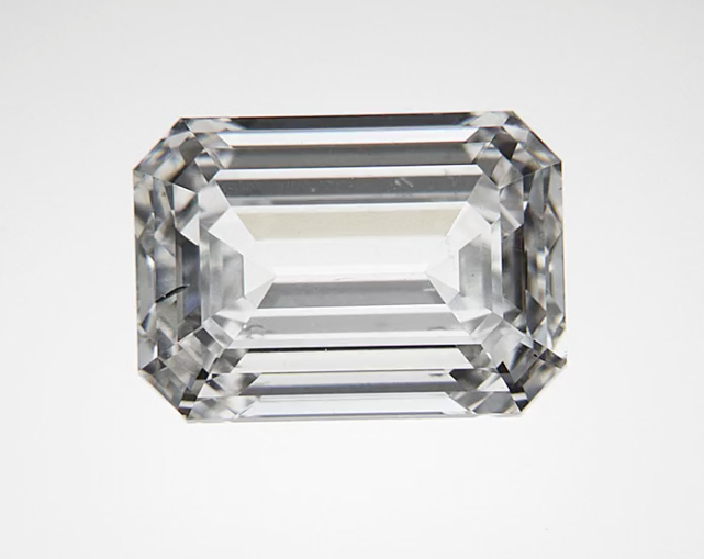 1.20CTW Lab Grown Diamond Emerald Cut Pavé Halo Engagement Ring With Filigree Design