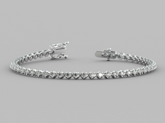 Silver bracelet with clear stones on a gray background